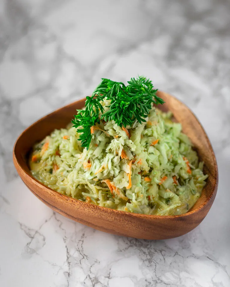 Fresh hummus Ottawa served in a bowl with olive oil and parsley