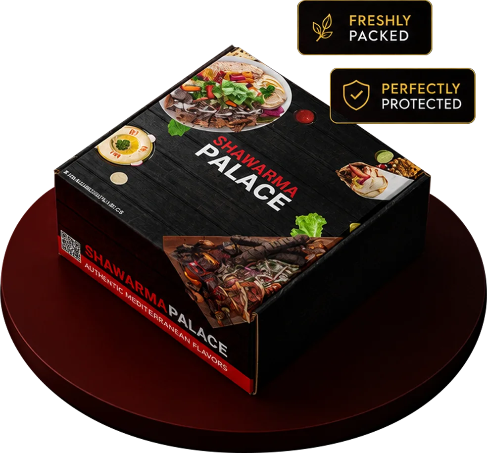 Shawarma Palace branded catering box with "Freshly Packed" and "Perfectly Protected" labels, showing shawarma, hummus and wraps printed on the packaging